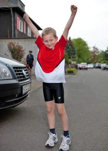 Erfolgreich sein. Kinder im Wettkampf und beim Sport.