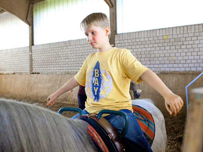 Therapie mit Pferden. Der Pferdesport für Kinder.